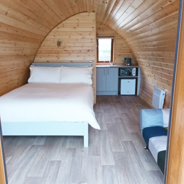 The Wheelhouse Pods Interior Bed & Kitchen